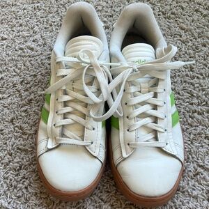 Adidas women’s cream and green sneakers